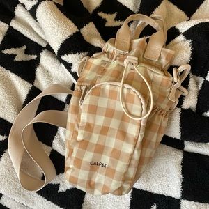 Calpak bottle holder purse